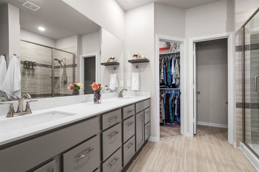 Luxurious primary bathroom with double sinks!