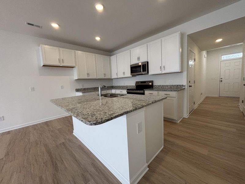 Furnished interior view inside a new home in CraigStone, Woodruff (Image 4).