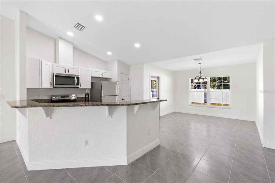 Furnished interior view inside a new home in , Summerfield (Image 8).