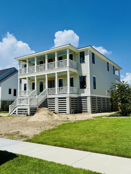 Front exterior of a new home in , Mount Pleasant, SC, highlighting curb appeal (Image 1).