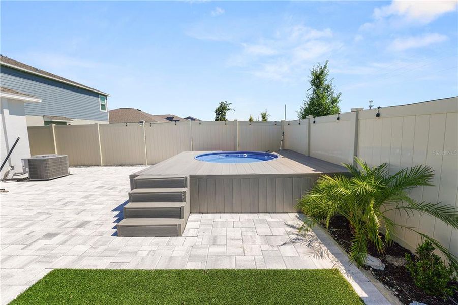 Exterior details and patio area of a home in Hunt Club Groves, Lake Wales (Image 31).