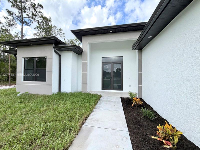 Exterior details and patio area of a home in , Naples (Image 4).