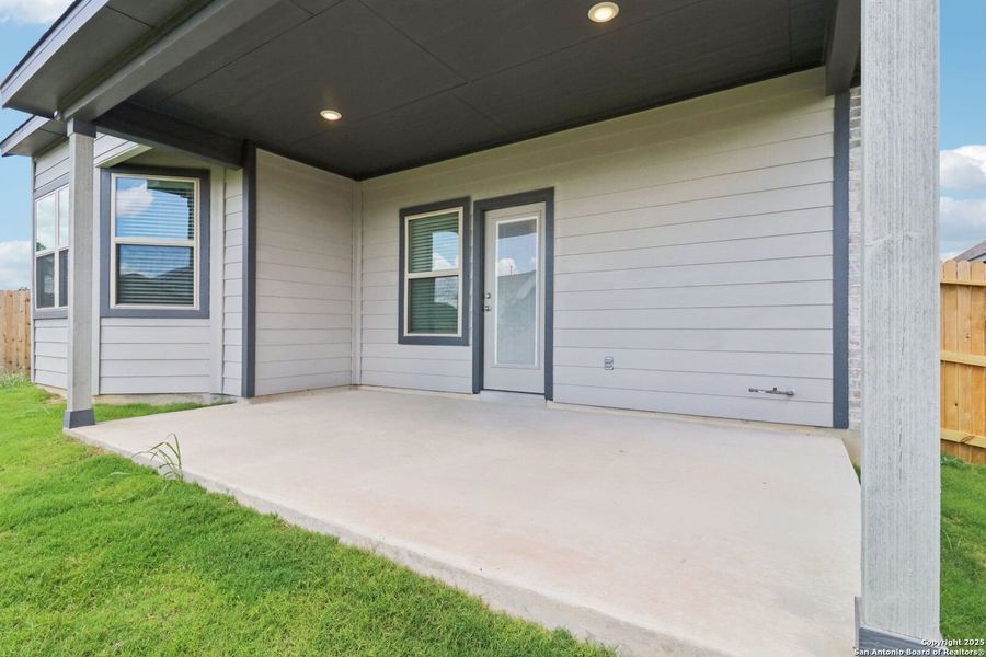 Front exterior of a new home in Kallison Ranch, San Antonio, TX, highlighting curb appeal (Image 1).