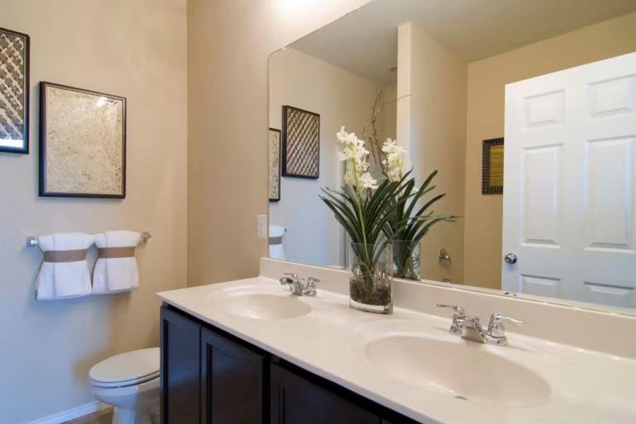 Photo of Centex model home with same floor plan, not of actual home listed.