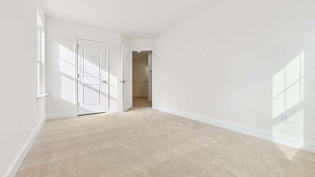 Furnished interior view inside a new home in Battle Bridge, Raleigh (Image 14).