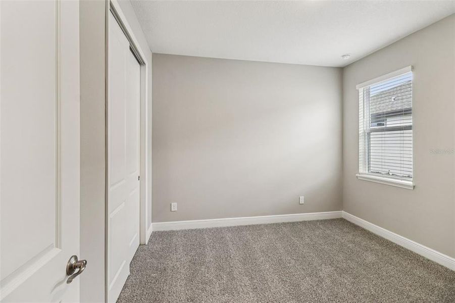 Spacious, unfurnished interior of a new home in Legends Preserve - Signature Series, Daytona Beach (Image 26).