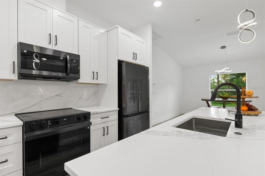 Furnished interior view inside a new home in , Port Charlotte (Image 15). Furnished interior view inside a new home in , Port Charlotte (Image 15).