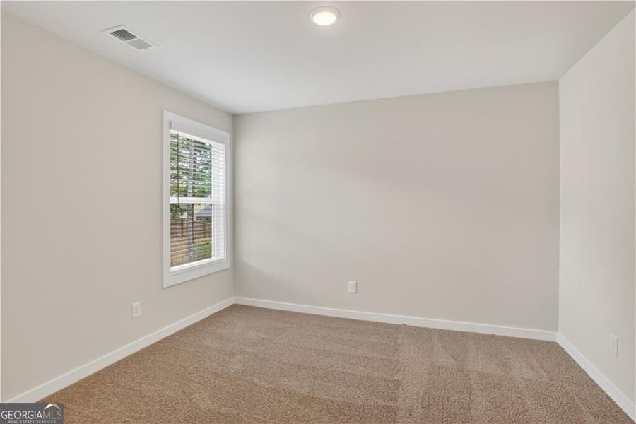 Spacious, unfurnished interior of a new home in The Fairways at Mirror Lake, Villa Rica (Image 64).