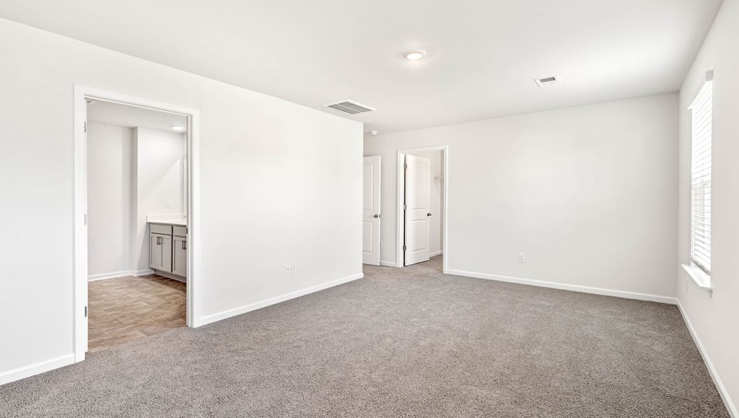 Spacious, unfurnished interior of a new home in Paddock Point, Roebuck (Image 23).