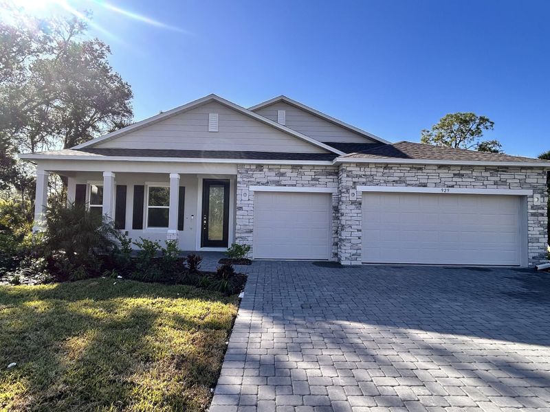 Front exterior of a new home in Eagle Crest, Malabar, FL, highlighting curb appeal (Image 1). Front exterior of a new home in Eagle Crest, Malabar, FL, highlighting curb appeal (Image 1).