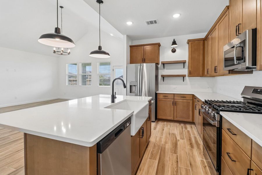 Chef-worthy kitchen with chestnut brown cabinets
