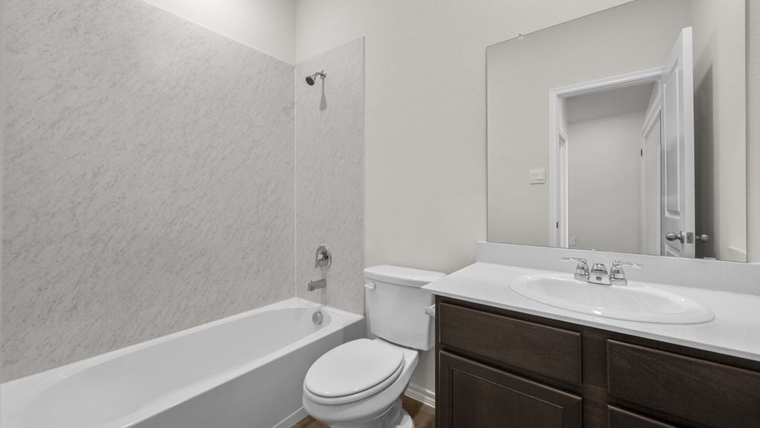 Furnished interior view inside a new home in Crane Crossing, Crandall (Image 12).