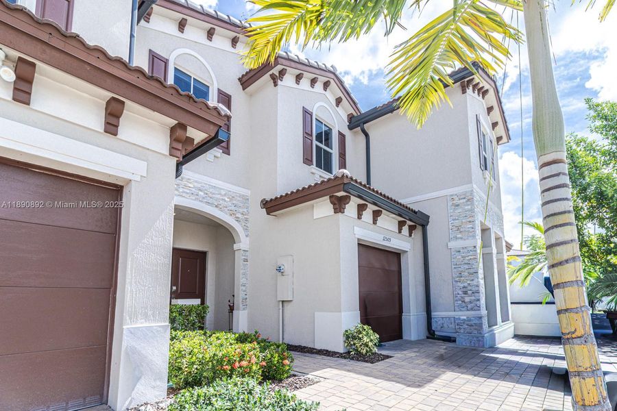 Exterior details and patio area of a home in , Miami (Image 19). Exterior details and patio area of a home in , Miami (Image 19).