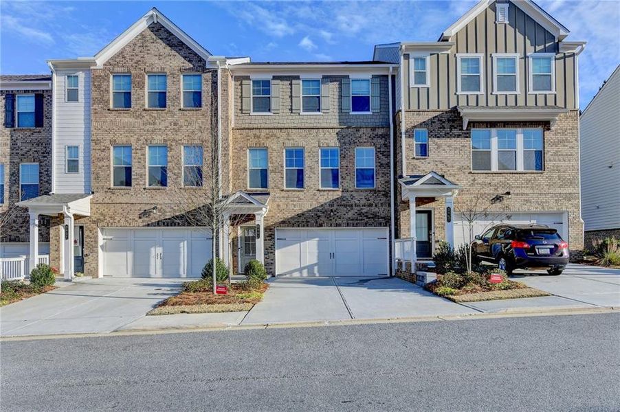 Front exterior of a new home in , Marietta, GA, highlighting curb appeal (Image 1). Front exterior of a new home in , Marietta, GA, highlighting curb appeal (Image 1).