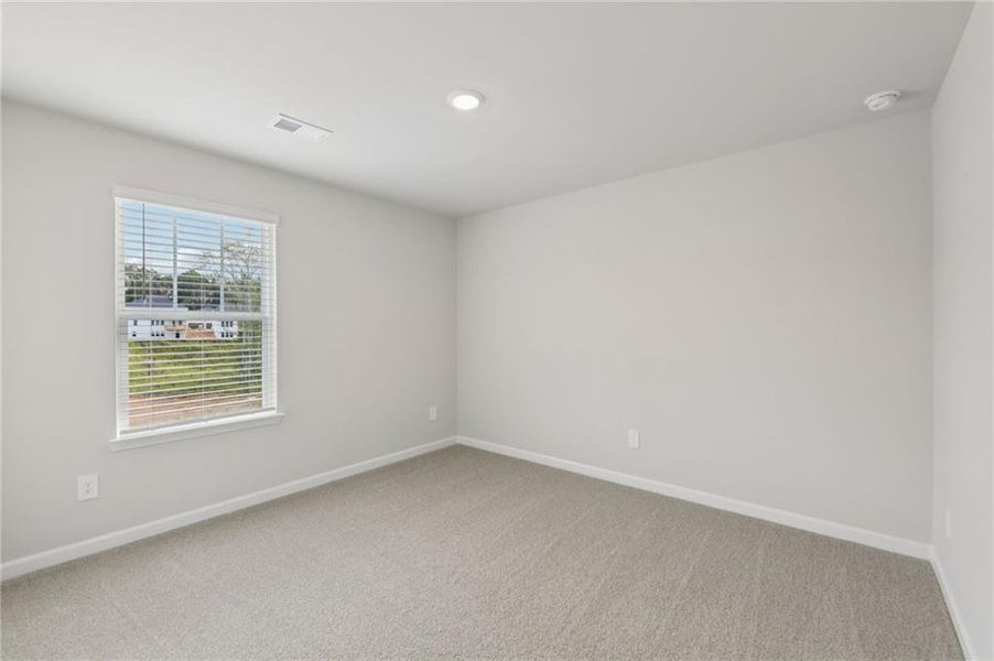 Spacious, unfurnished interior of a new home in Vines at Mill Creek - Estate Series, Braselton (Image 29). Spacious, unfurnished interior of a new home in Vines at Mill Creek - Estate Series, Braselton (Image 29).