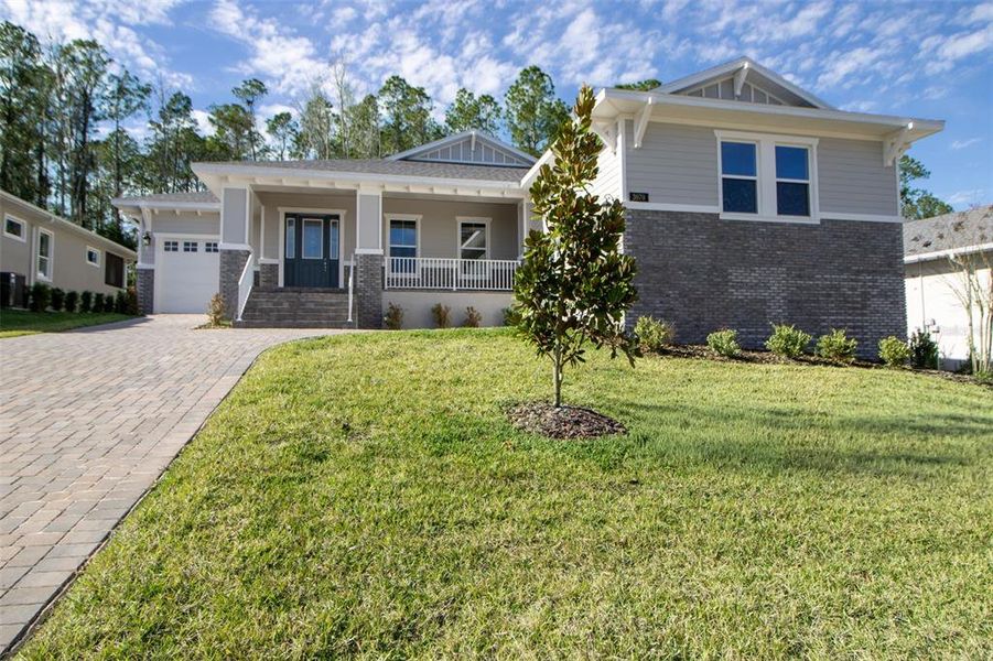 Front exterior of a new home in , Brooksville, FL, highlighting curb appeal (Image 24).
