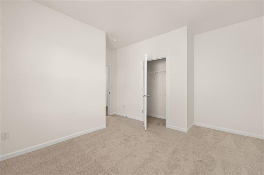 Spacious, unfurnished interior of a new home in Preserve at Dove Creek, Statham (Image 22).