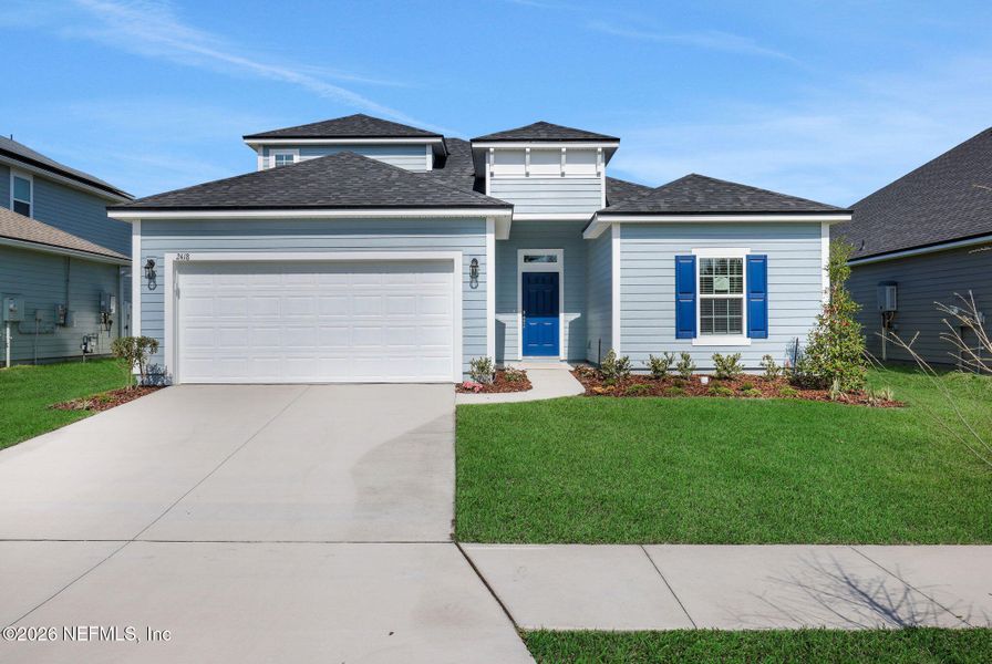 Front exterior of a new home in Jennings Farm, Middleburg, FL, highlighting curb appeal (Image 24).