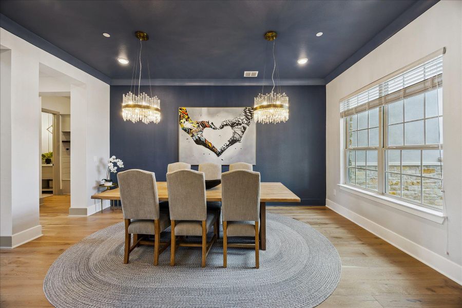 Double Crystal Chandeliers add elegance to the dining room