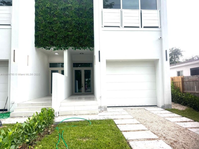 Front exterior of a new home in , Miami, FL, highlighting curb appeal (Image 1).