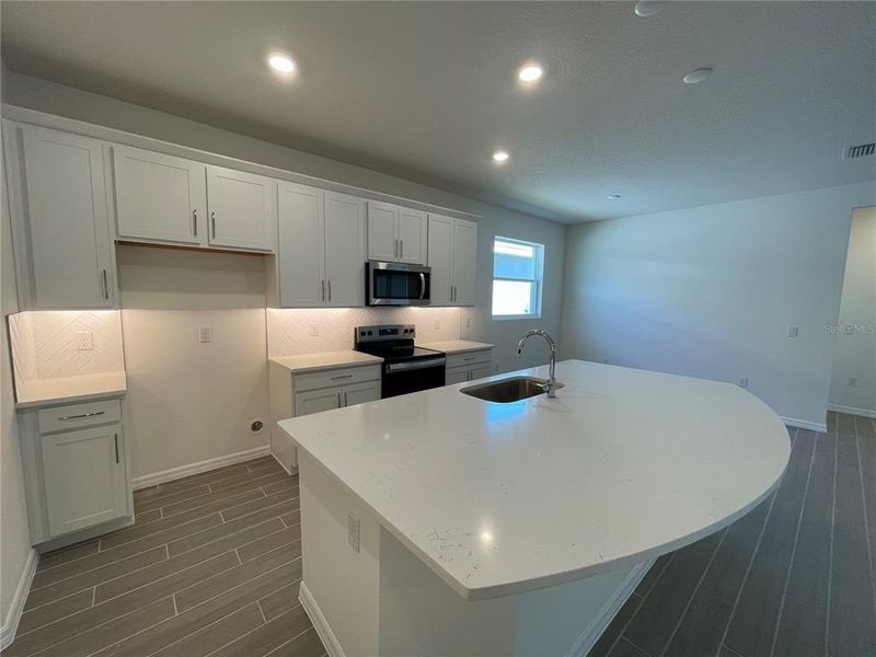 Furnished interior view inside a new home in Angeline, Land O' Lakes (Image 7).