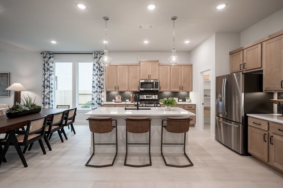 Representative furnished interior of a home built from the Falcon by Tri Pointe Homes in Pecan Ridge, Fulshear (Image 56).