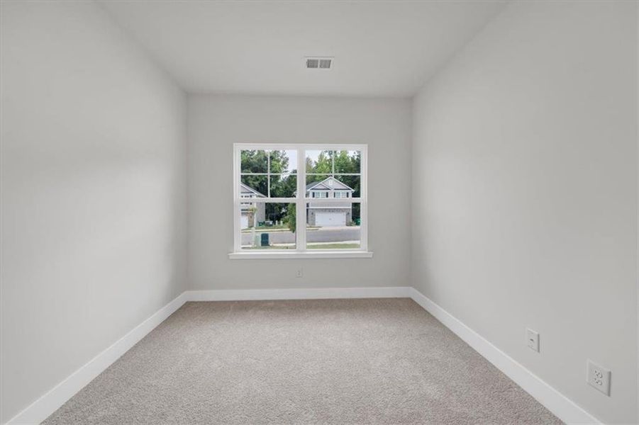 Spacious, unfurnished interior of a new home in Canterbury Villas, Carrollton (Image 24).