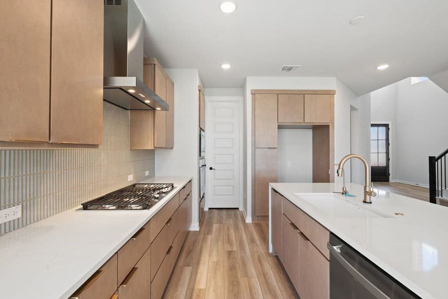 Furnished interior view inside a new home in Terrace Collection At Turner's Crossing, Buda (Image 9).