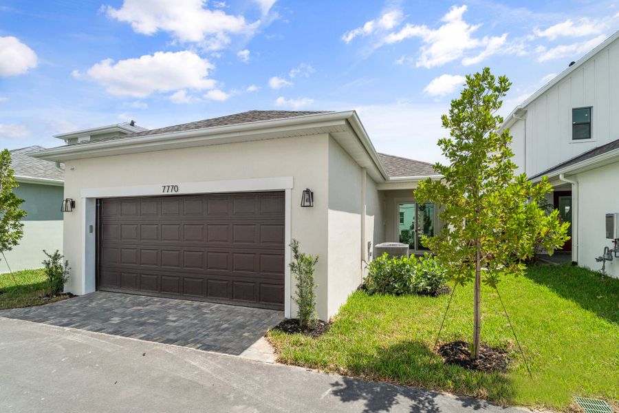 Representative exterior photo of a completed home built from the Monarch by Mattamy Homes in Newfield, Palm City, FL (Image 15).