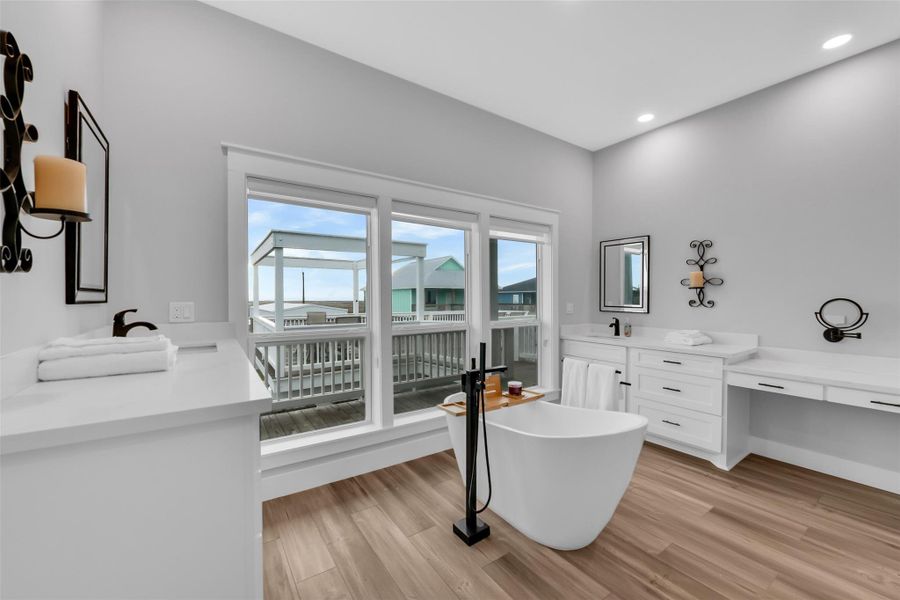 Primary Bathroom and featuring a bath tub overlooking the canal Primary Bathroom and featuring a bath tub overlooking the canal