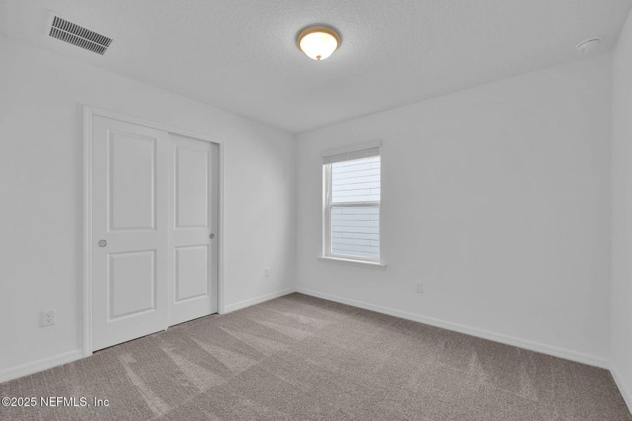 Spacious, unfurnished interior of a new home in Wells Landing, Jacksonville (Image 19).