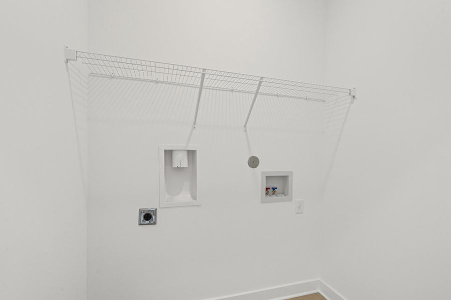 Laundry room featuring hookup for an electric dryer and hookup for a washing machine