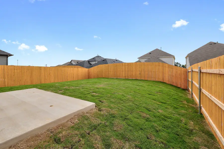 Exterior details and patio area of a home in Trinity Ranch, Elgin (Image 4).