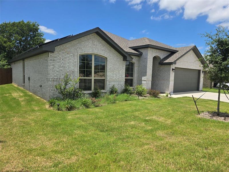 Front exterior of a new home in Trail Creek, Cleburne, TX, highlighting curb appeal (Image 2). Front exterior of a new home in Trail Creek, Cleburne, TX, highlighting curb appeal (Image 2).