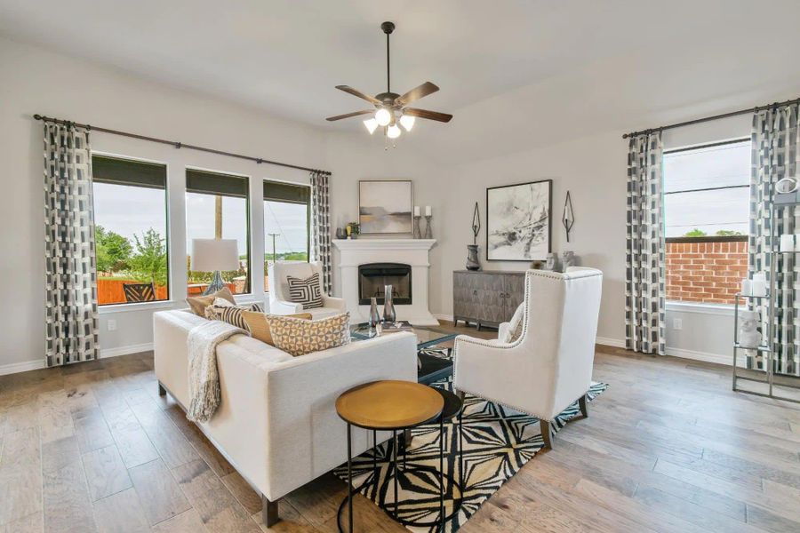 Family Room | Concept 2434 at Coyote Crossing in Godley, TX by Landsea Homes