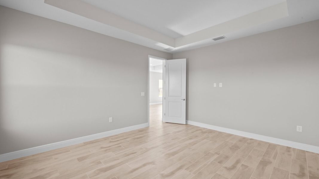 Spacious, unfurnished interior of a new home in Verandah, Fort Myers (Image 17).