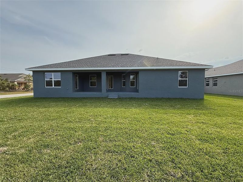 Exterior details and patio area of a home in South Gulf Cove, Port Charlotte (Image 15).