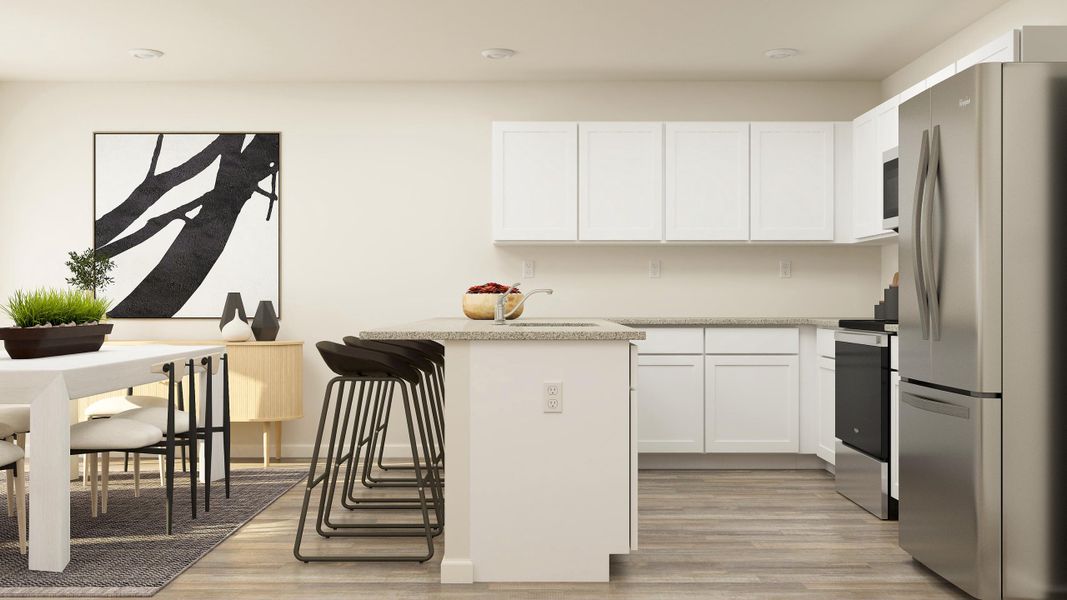 A kitchen with white cabinets. A kitchen with white cabinets.