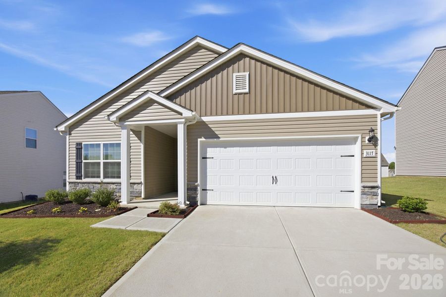 Front exterior of a new home in Stagecoach Station, Gastonia, NC, highlighting curb appeal (Image 18).