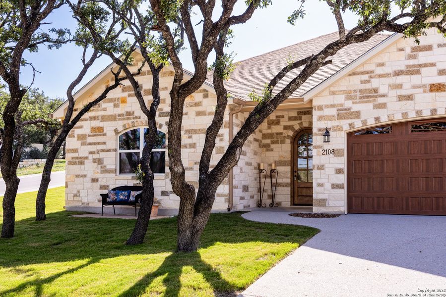 Front exterior of a new home in , Kerrville, TX, highlighting curb appeal (Image 1).