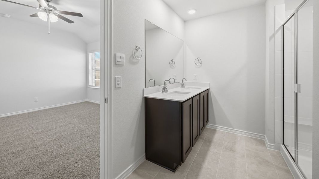 Representative furnished interior of a home built from the Douglas by D.R. Horton in Silverado, Aubrey (Image 8).
