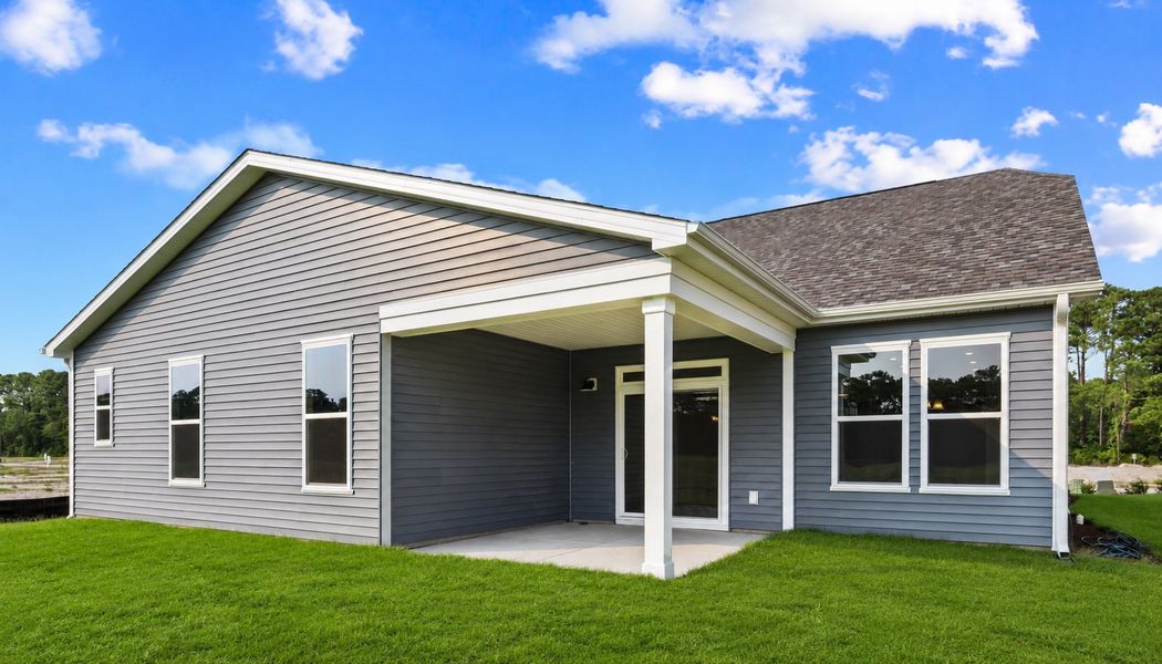 Exterior details and patio area of a home in Bridgewater - Shorehaven Village, Little River (Image 3).