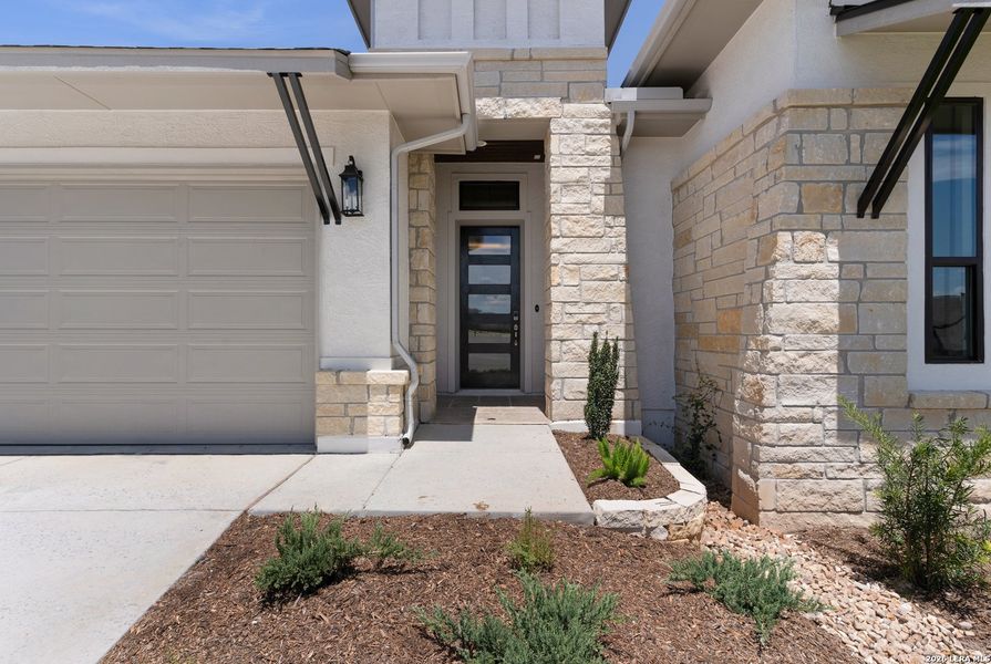 Exterior details and patio area of a home in El Sonido at Campanas, San Antonio (Image 30). Exterior details and patio area of a home in El Sonido at Campanas, San Antonio (Image 30).
