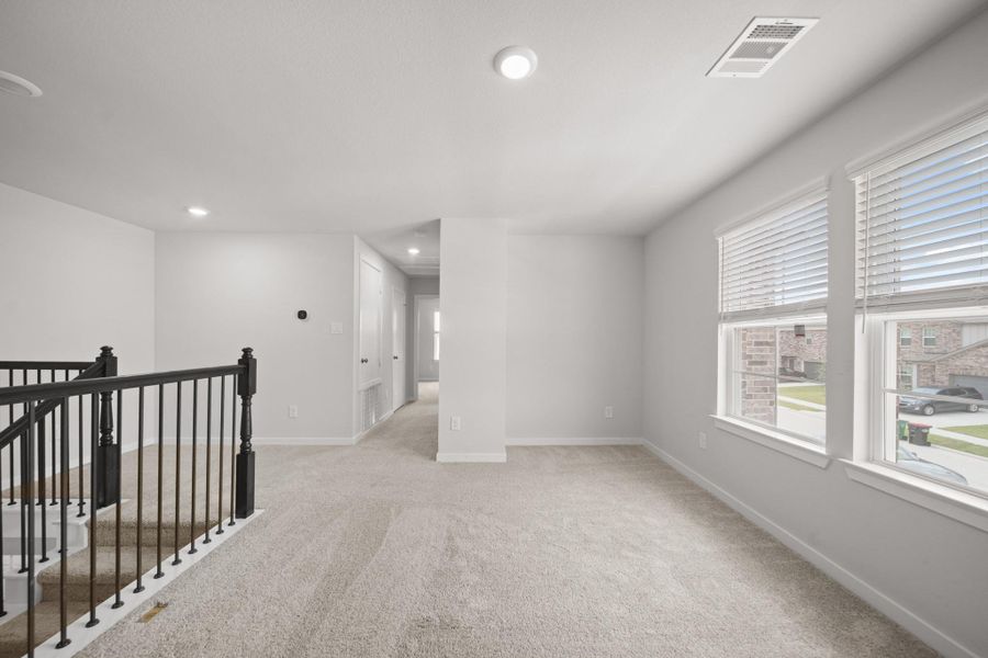 Spacious, unfurnished interior of a new home in Sunterra, Katy (Image 28).