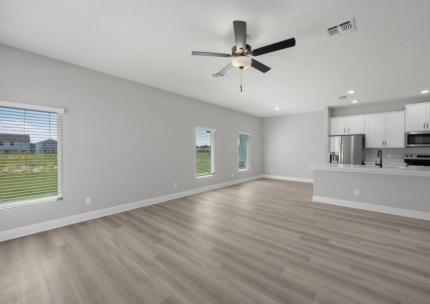 The dining room is open to the kitchen and family room. The dining room is open to the kitchen and family room.