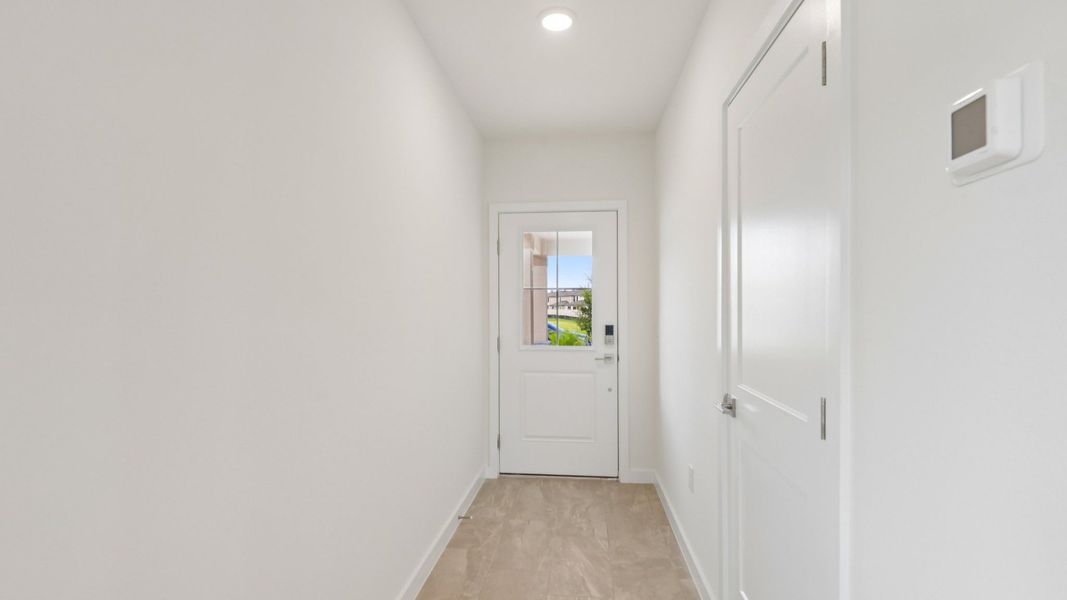 Furnished interior view inside a new home in Grasslands West, Lakeland (Image 26).