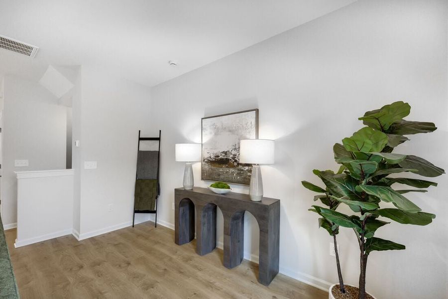 Representative furnished interior of a home built from the Cobblestone by Taylor Morrison in Buffalo Townes, Garner (Image 11).