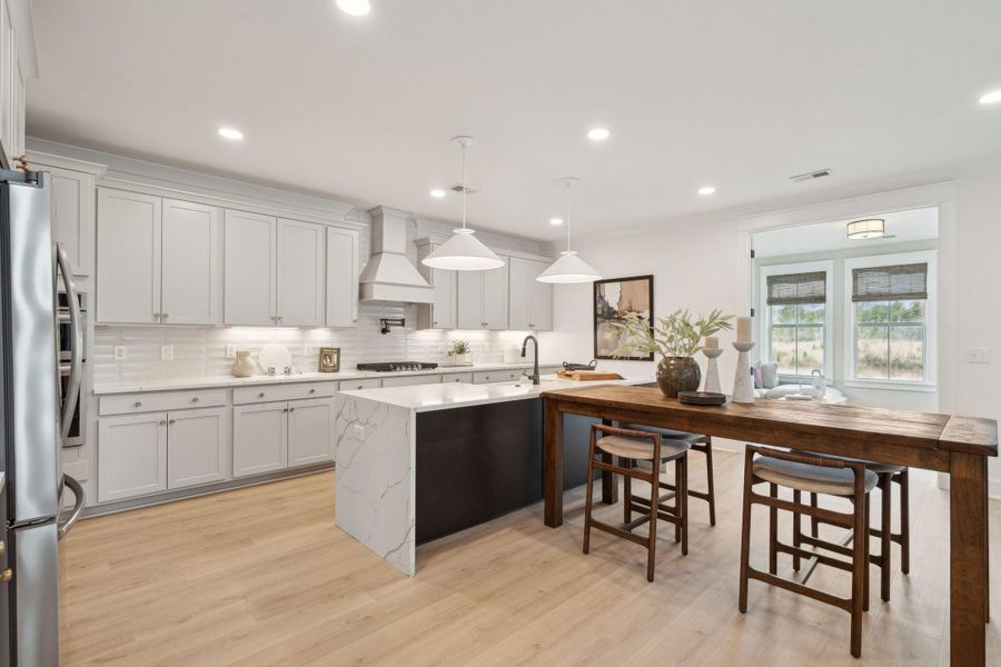 Furnished interior view inside a new home in Tidewater at Lakes of Cane Bay, Summerville (Image 13).