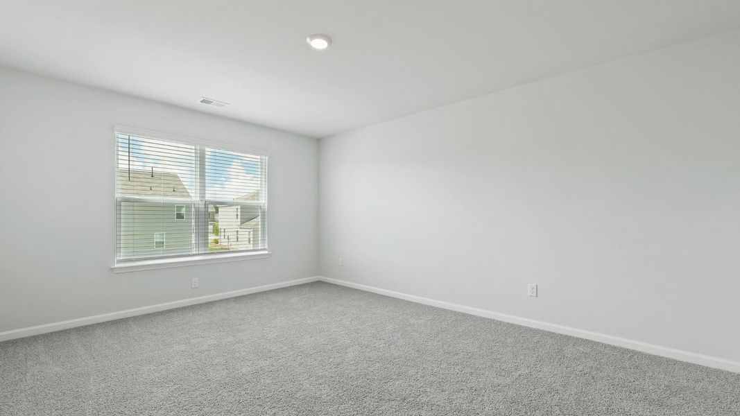 Spacious, unfurnished interior of a new home in Pine Hills at Cane Bay, Summerville (Image 14).