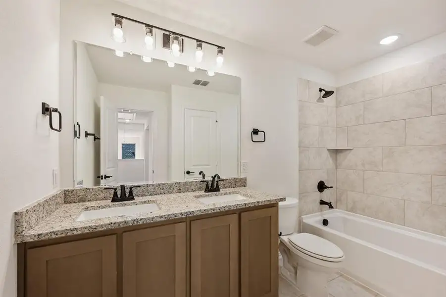 Furnished interior view inside a new home in Bear Creek Classic 50, Lavon (Image 6).